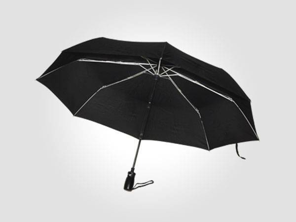 Folded hands full from open umbrella